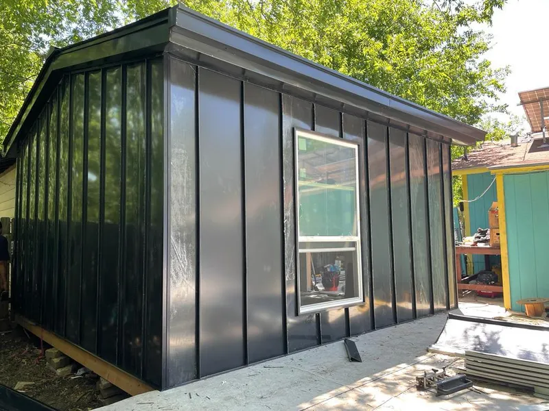 Black standing seam metal wall panels for Metal Roof Installation in Holdenville