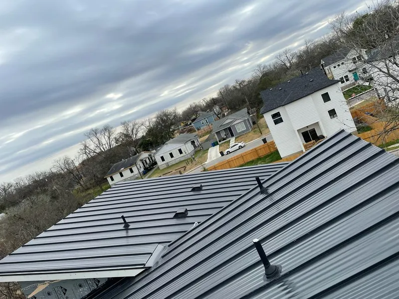 Standing seam metal roof panels with vents for Skylight Repair in Holdenville